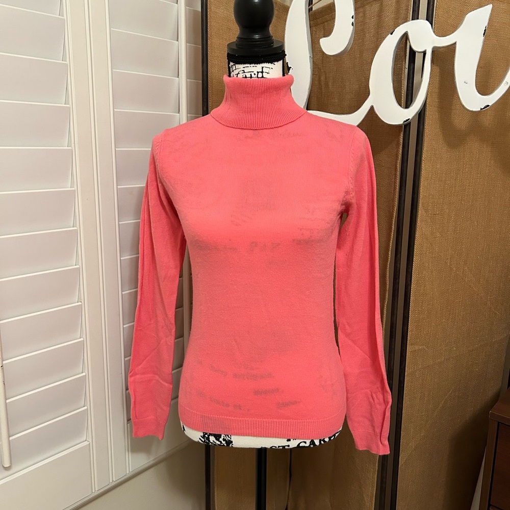 Pink turtleneck